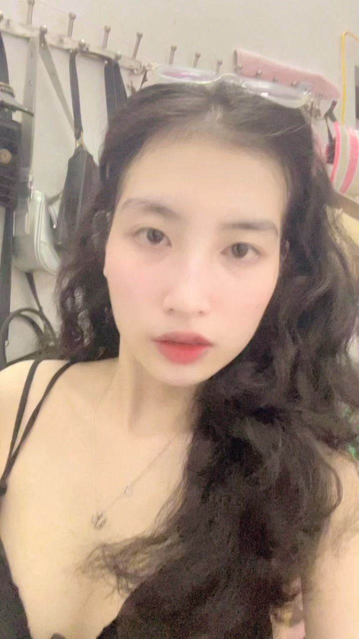 woman live in a vertical video frame